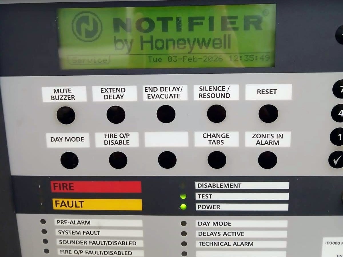 Notifier ID3000 fire alarm panel in service mode during a routine maintenance visit